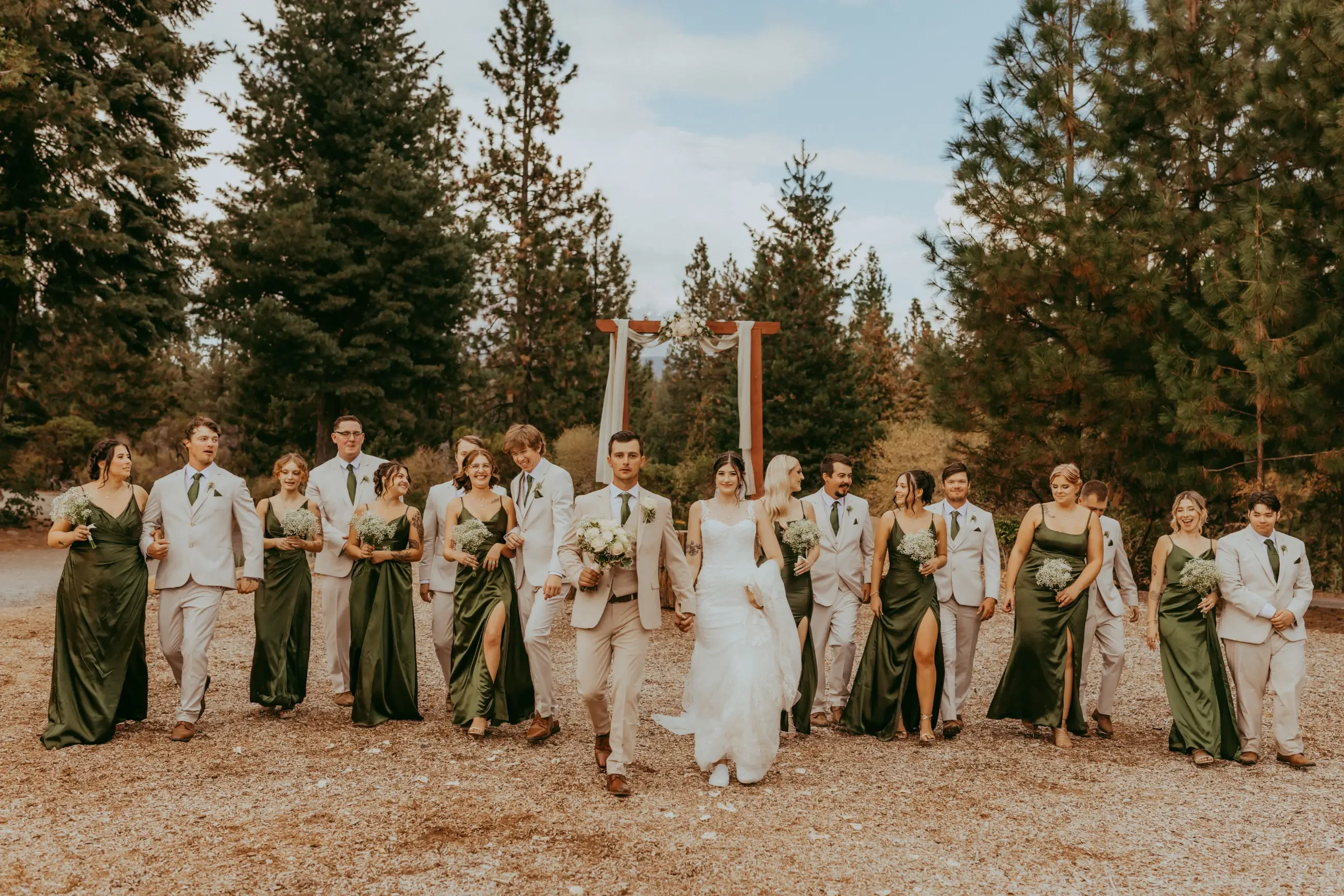 image shows bride, husband, and their full wedding party