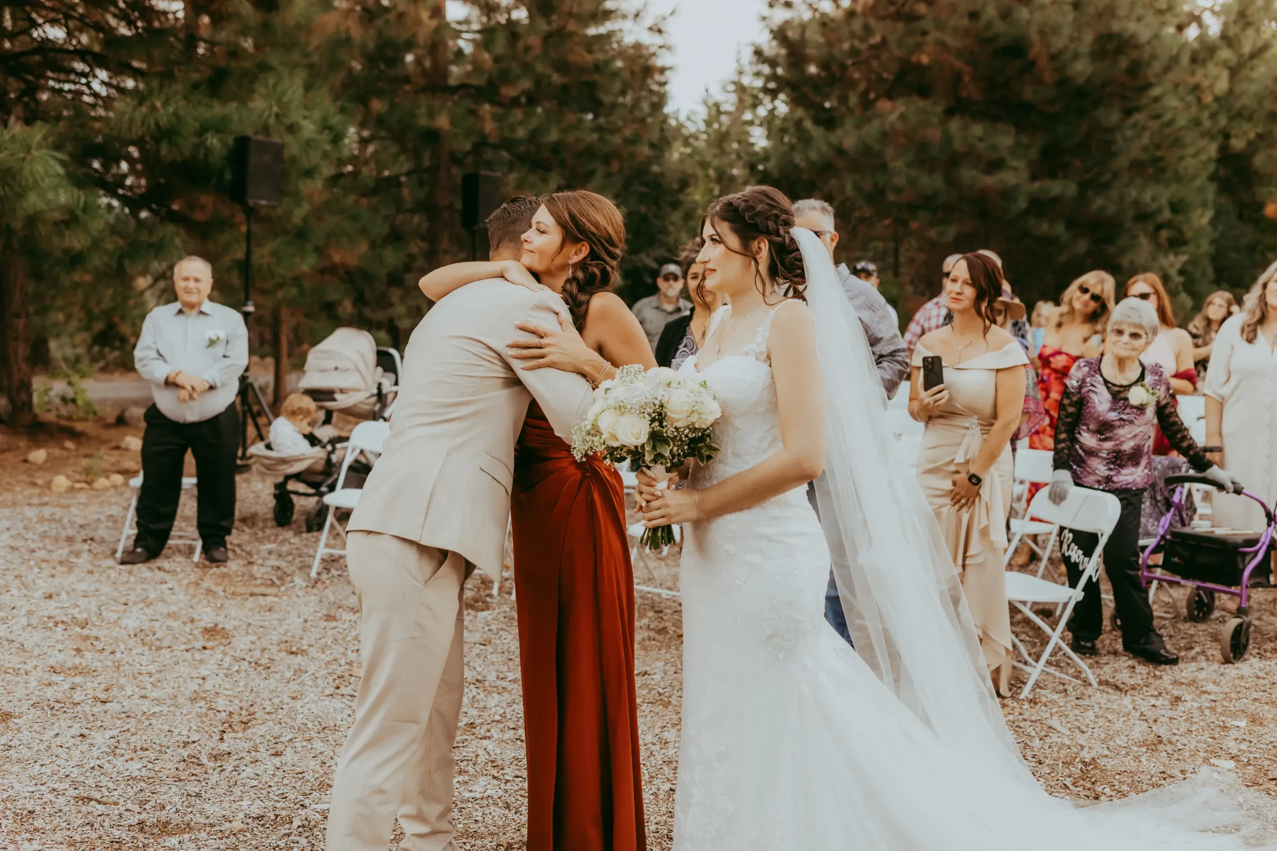 image shows wife, husband, and mother in law on their wedding day
