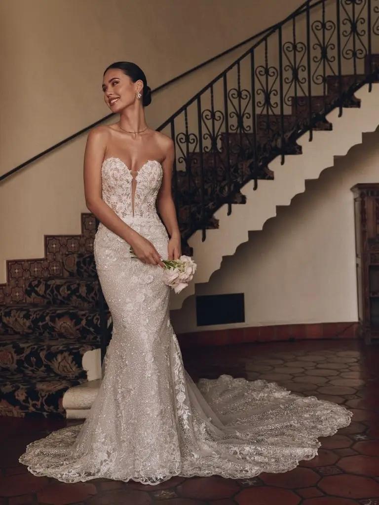 Model wearing a white gown by Sottero & Midgley