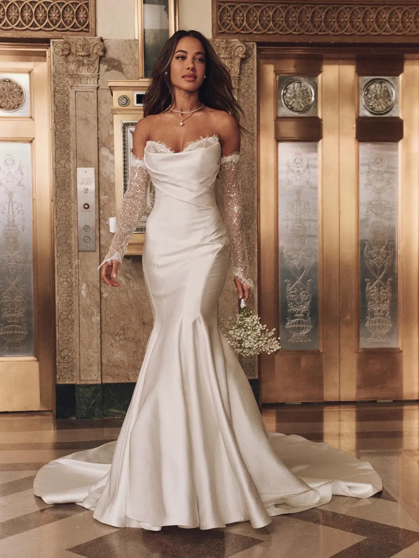 Model wearing a white gown by Maggie Sottero