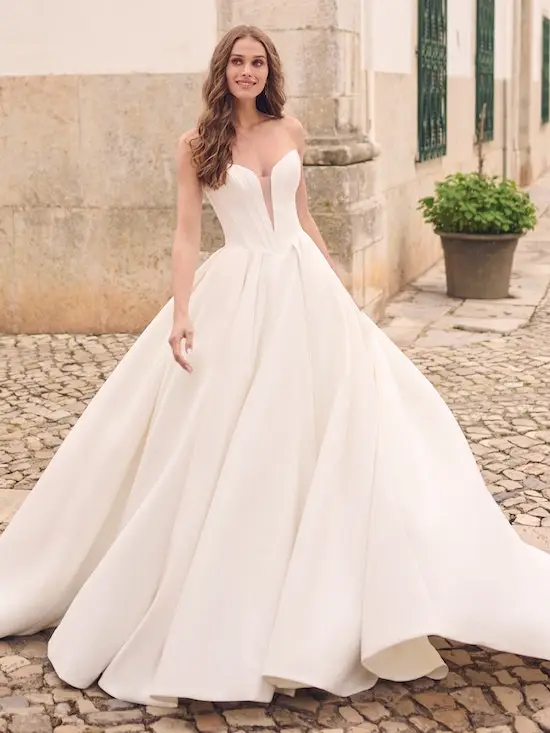 Model wearing a white gown by Maggie Sottero
